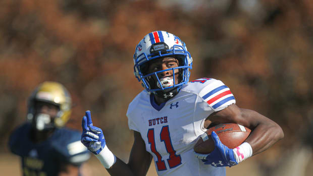 Hutchinson Blue Dragons receiver Malik Benson (11) scores on the opening play of the game in the KJCCC semifinals against the Independence Pirates Sunday, Nov 14, 2021 in Independence.